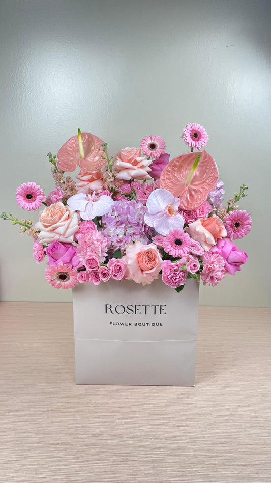PINK FLOWER PAPER BAG ARRANGEMENT